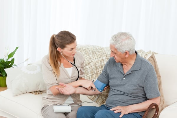 Nurse Care Manager helping her patient or client to stay healthy at home