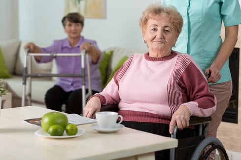 Disabled woman getting help