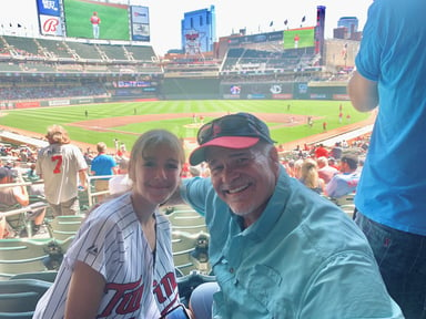 Attending the Twins game with granddaughter